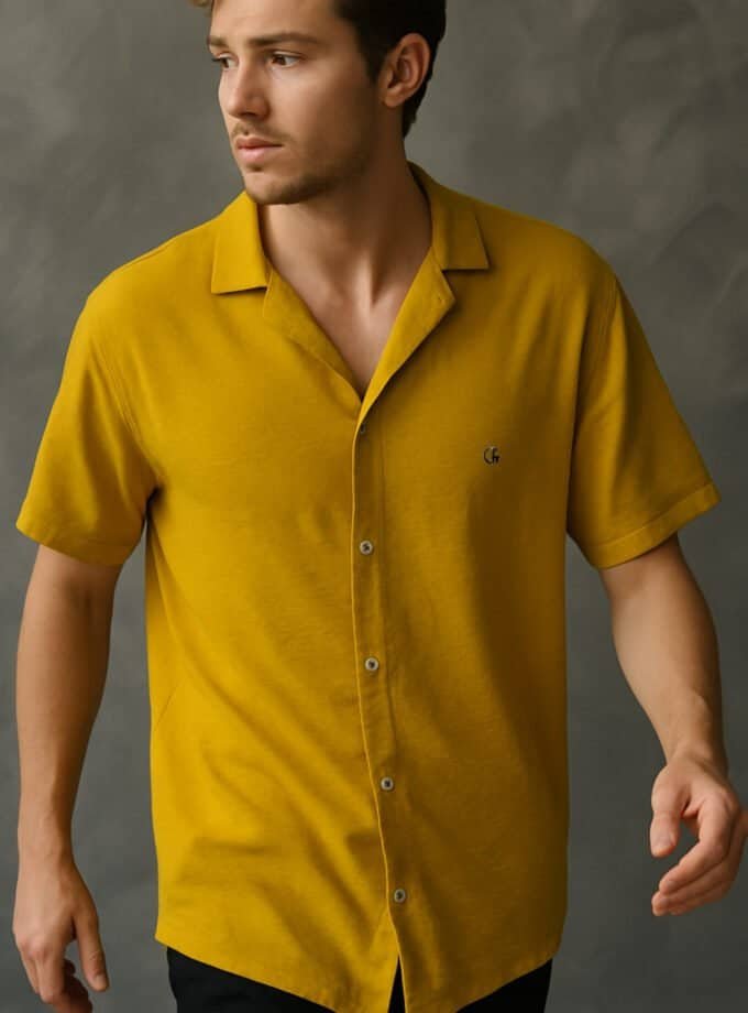 Elegant mustard yellow short-sleeve button-up shirt for men, stylish and comfortable, perfect for casual and semi-formal occasions.