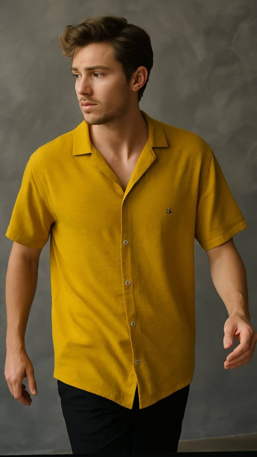 Elegant mustard yellow short-sleeve button-up shirt for men, stylish and comfortable, perfect for casual and semi-formal occasions.