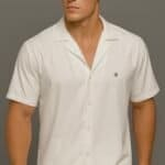 Confiture nyc men in stylish white shirt, modern fashion, casual chic, NYC clothing boutique, trendy menswear, summer fashion, fashion photography.