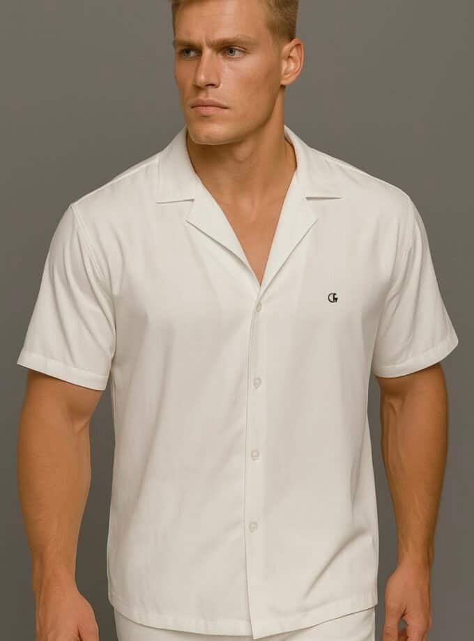 Confiture nyc men in stylish white shirt, modern fashion, casual chic, NYC clothing boutique, trendy menswear, summer fashion, fashion photography.