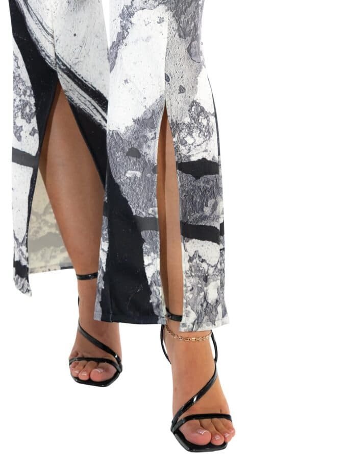 Strappy high heels and printed slit trousers, fashionable women's clothing, modern style, black and white abstract design, stylish outfit for trendy women, Confiture NYC fashion image.