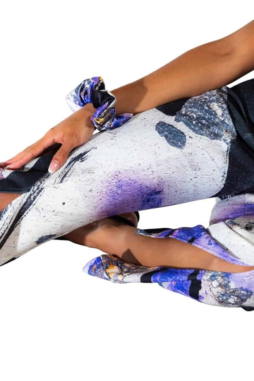 Vibrant abstract printed clothing with textured, artistic designs showcasing modern fashion styles.